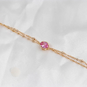 Elegant 14k gold plated S925 silver double-chain bracelet with pink oval corundum stone