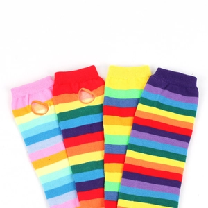 Colorful rainbow striped knit arm warmers with thumb holes for pride party events
