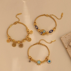 Bohemian gold stainless steel bracelet set with evil eye and tree of life charms