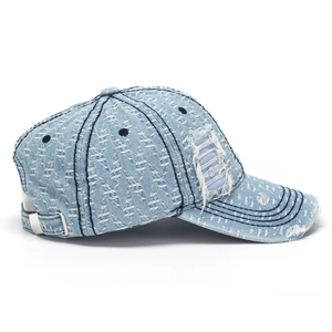 Distressed light blue denim baseball cap with vintage rips and adjustable metal buckle