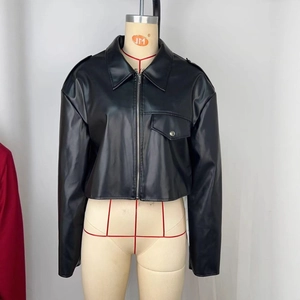Women black short faux leather jacket with lapel collar and chest pocket on mannequin