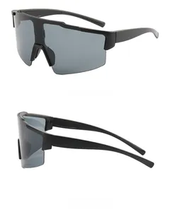 Dual view of black sports sunglasses featuring a frameless shield design and polarized lenses