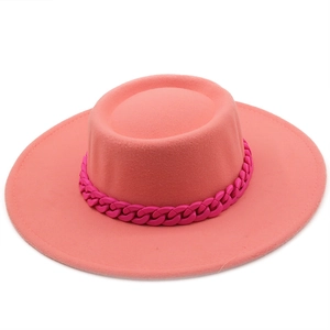 Coral pink wide brim wool fedora hat featuring a stylish magenta chain decorative band