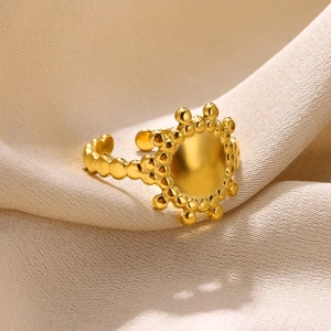 Minimalist gold sunburst adjustable open ring with sun mirror center and beaded texture