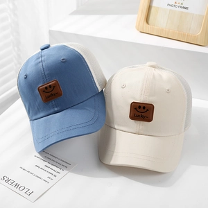 Breathable mesh baseball cap with smiley leather patch for toddlers in blue and beige