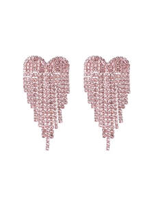 Detail view of long rhinestone heart tassel earrings with pink crystals and fringe drop