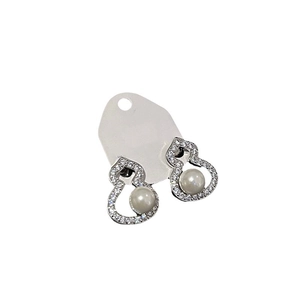Silver pearl gourd earrings set with shimmering zircon crystals on white background