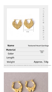 Detailed view of 2cm titanium gold heart earrings with ribbon bow design and 7.8g weight