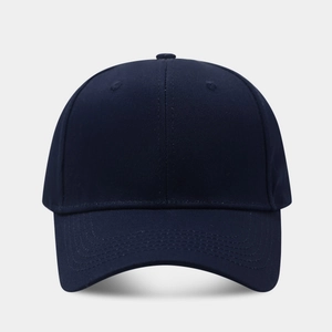 Detail of navy blue baseball cap showing breathable eyelets and premium twill fabric texture