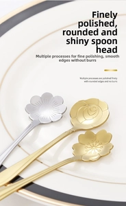 Detailed view of polished stainless steel flower-shaped dessert spoons in a ceramic dish