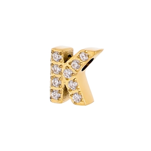 Macro view of gold-plated letter K charm with micro-pave cubic zirconia crystals