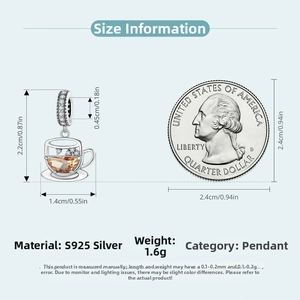 Detail of S925 sterling silver coffee cup charm with amber stone and size measurements