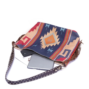 Bohemian woven canvas tote bag interior view showing capacity for tablet and smartphone
