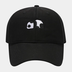 Close-up of black cotton baseball cap featuring detailed cute panda embroidery detail