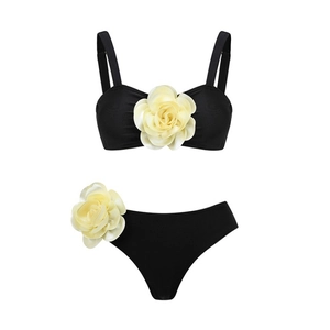 Two-piece black bikini set featuring 3D cream rose flowers and high-waist swim bottoms