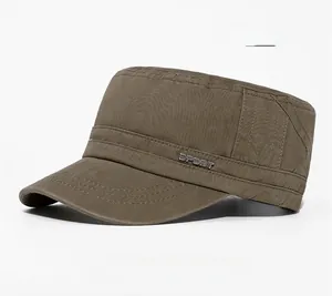 Detail of army green cotton flat top military cap with metal SPORT logo and stitching