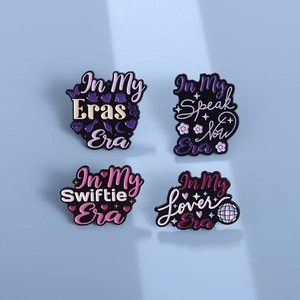 Creative enamel pin set featuring floral heart and disco ball letter elements for backpacks