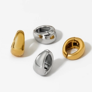 Minimalist thick chunky hoop earrings set in polished gold and silver stainless steel