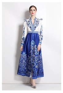 Detail of blue and white floral V-neck dress with satin finish and button front