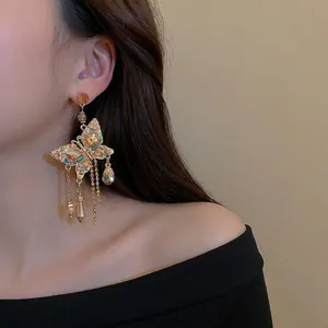 Elegant butterfly tassel earrings with colorful crystals and long golden metal chains