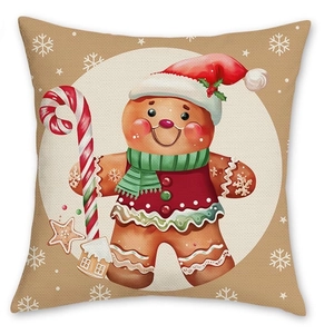 Christmas throw pillow cover featuring festive gingerbread man and snowflake patterns