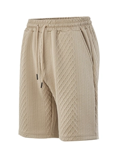 Detail of men's casual shorts showing breathable jacquard knit fabric and adjustable drawstring