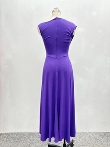 Detail view of the back of a purple sleeveless A-line maxi dress with zipper closure