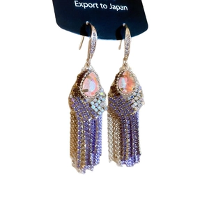 Vintage gold leaf tassel earrings with purple crystals and sparkling rhinestone accents
