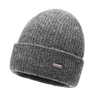 Unisex grey ribbed knit beanie with silver metallic logo tag for winter warmth