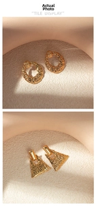 Detailed view of hammered gold geometric earrings with elegant textured finish