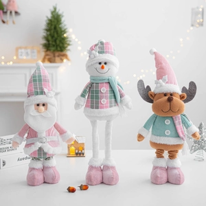 Set of 3 plush Christmas dolls featuring Santa, snowman and reindeer in pink and mint green
