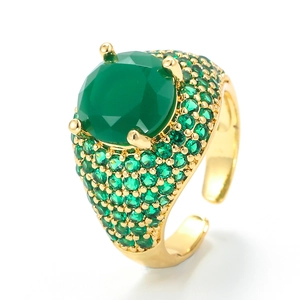 Gold plated hip hop ring featuring large round green gemstone and micro-pave crystals