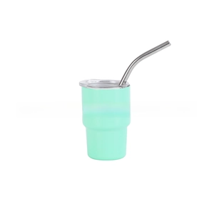 Close-up of mint green 3oz stainless steel tumbler with straw and clear lid