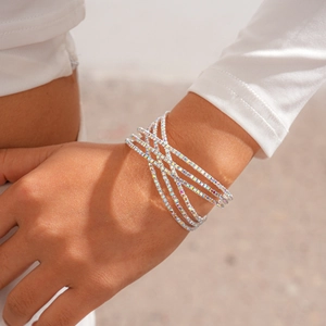 Detailed view of silver five-layer crisscross bracelet with iridescent AB rhinestones