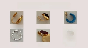 Detail view of various clip-on earring styles including screw and silicone pad mechanisms