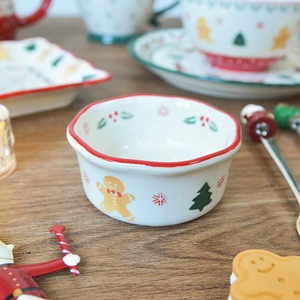 Retro Christmas ceramic sauce dish with gingerbread man and tree patterns on white glaze