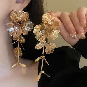 Baroque floral tassel earrings with golden mesh and sparkling crystal accents for brides
