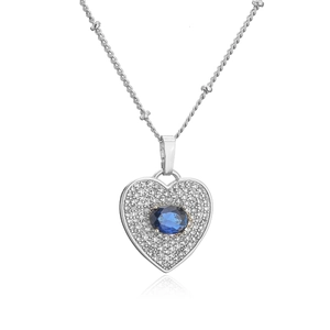 Detail of silver heart necklace with oval blue gemstone and micro-pave cubic zirconia