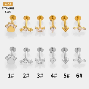 G23 Titanium labret jewelry set with star and crown shapes in gold and silver finish