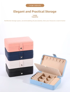 Detailed internal storage compartments and ring slots of the portable PU leather jewelry box