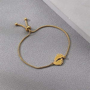 Adjustable gold stainless steel box chain bracelet featuring two cute baby feet charms
