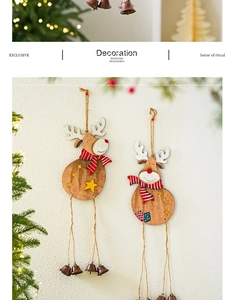 Detail of wooden reindeer Christmas ornaments with festive scarves and bronze bells