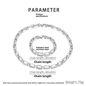 Detail of paperclip chain link jewelry set with textured patterns in stainless steel