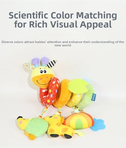 Close-up of baby spiral activity toy with colorful giraffe and animal hanging charms