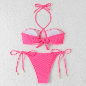 Neon pink puckered waffle texture bikini set with halter ties and shell pendants