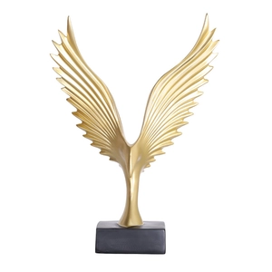 Modern gold eagle wing sculpture with black base for minimalist home office desktop decor