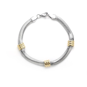 Men's titanium steel Cuban bracelet with gold beads and silver links on white background