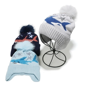 Kids warm knit shark ski hats with pom-poms and earflaps in navy, blue and grey