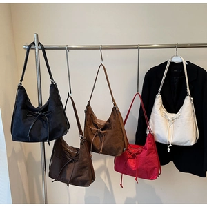 Minimalist suede hobo bags for women in five colors with bow detail and metal rings