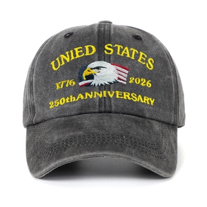 Close-up of embroidery featuring eagle and flag on washed grey cotton baseball cap
